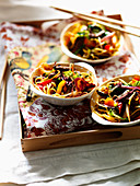 Fried egg noodles with cabbage, yellow pepper and bean sprouts (Asia)