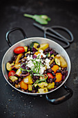 Sauteed Vegetables with black beans in a pan
