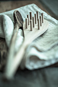 A wooden spoon and a wooden pasta spoon