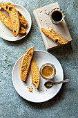 Italian biscotti and a cup of coffee on a plate