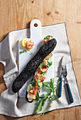 Black salmon sandwich
