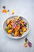 Lily flower salad with grilled apricots and a hibiscus and chilli dressing