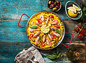 Traditional seafood paella in the fry pan