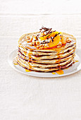Gluten free crepes with nuts and oranges