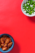 Oven-roasted, soft tomatoes, and oriental peas with coconut