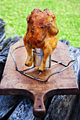Grilled beer can chicken with honey and chili