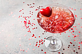 Fresh red margarita cocktail with hearts