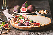 Delicious Tart with honey and mascarpone cheese cream and fresh figs