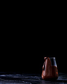 Chocolate sauce in a glass jug