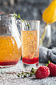 Fresh berry drink with blueberries, raspberries and seeds