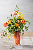 Bouquet of carrots, ranunculus and tulips