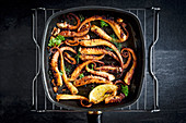 Served grilled octopus with spices