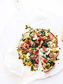 Speedy prosciutto, basil and mozzarella pizza