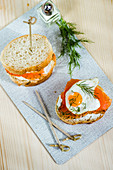 Baguette with salmon and a fried quail's egg