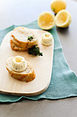 Slices of baguette with lemon butter