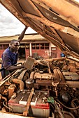 Mechanic fixing a car