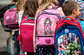 Schoolchildren with backpacks