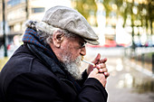 Man smoking outside