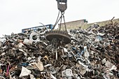 Electromagnet in scrap metal yard