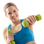 Woman using hand weights