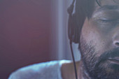 Man listening to music on headphones