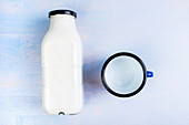 Milk bottle and metal cup