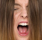 Woman shouting with mouth open