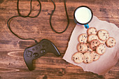 Gamepad controller with cookies and milk