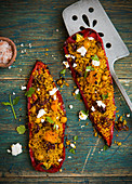 Stuffed sweet long pepper with vegetarian cous cous and feta cheese
