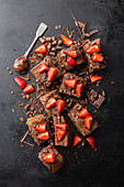 Brownies with strawberries and chocolate sauce