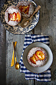 Peach tartlet with flaked almonds and icing sugar