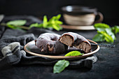 Vegan chocolate mint icecream donuts with dark chocolate icing