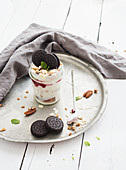 Yogurt oat granola with berries, honey, nuts and cookies