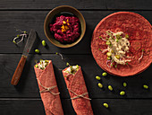Beetroot wraps with hummus, edamame and sprouts