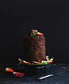 Rustic chocolate high cake with strawberry