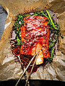 Oven-baked salmon on a piece of baking paper (Korea)