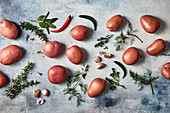Red potatoes, garlic, chili peppers and herbs