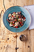 Octopus salad with herb olives