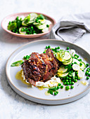 Lamb rump with zucchini, peas and mint