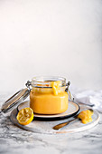 Home made lemon curd in a jar
