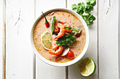 Traditional thai soup tom yum with shrimps and mushrooms