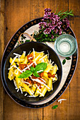 Gluten-free penne bolognese with Parmesan cheese