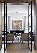 Glance into the elegant living room with artwork on the wall