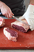 Rump steak being cut