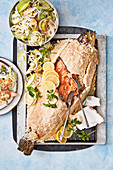 Salt crusted ocean trout with fennel apple salad