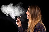 Teenage girl vaping