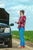 Woman with broken downcar