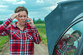 Woman with broken downcar