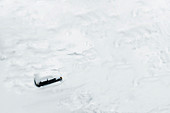 Car trapped in deep snow