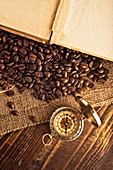 Coffee beans and compass